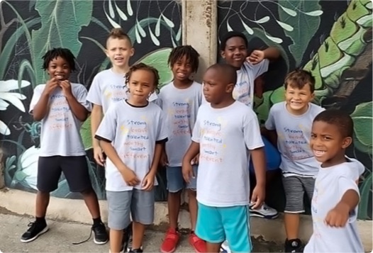 a group of young students hanging out outdoors