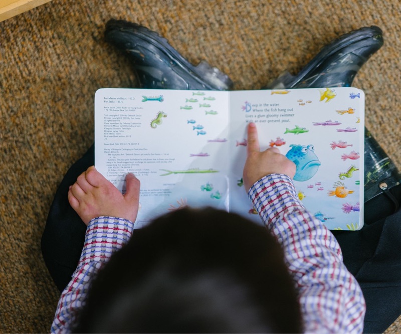 a student reading words thoughtfully